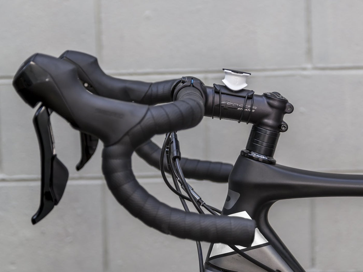 Quad Lock custom white bike mount on road bike