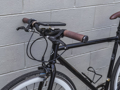 Quad Lock custom white collar bike mount on bike
