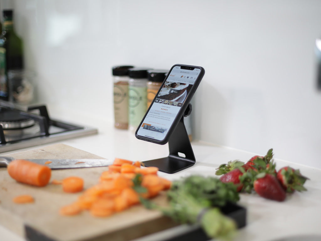 Quad Lock desk mount being used in the kitchen to show recipe while cooking